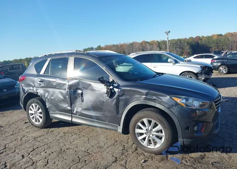 2016 Mazda Cx-5 Touring z USA, uszkodzony, nr VIN JM3KE2CYXG0745492